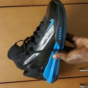 Patent leather, black on blue nikes size 10.